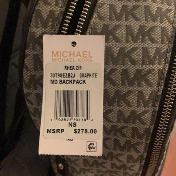 Grey ,Black, and silver Micheal kors backpack main image 6